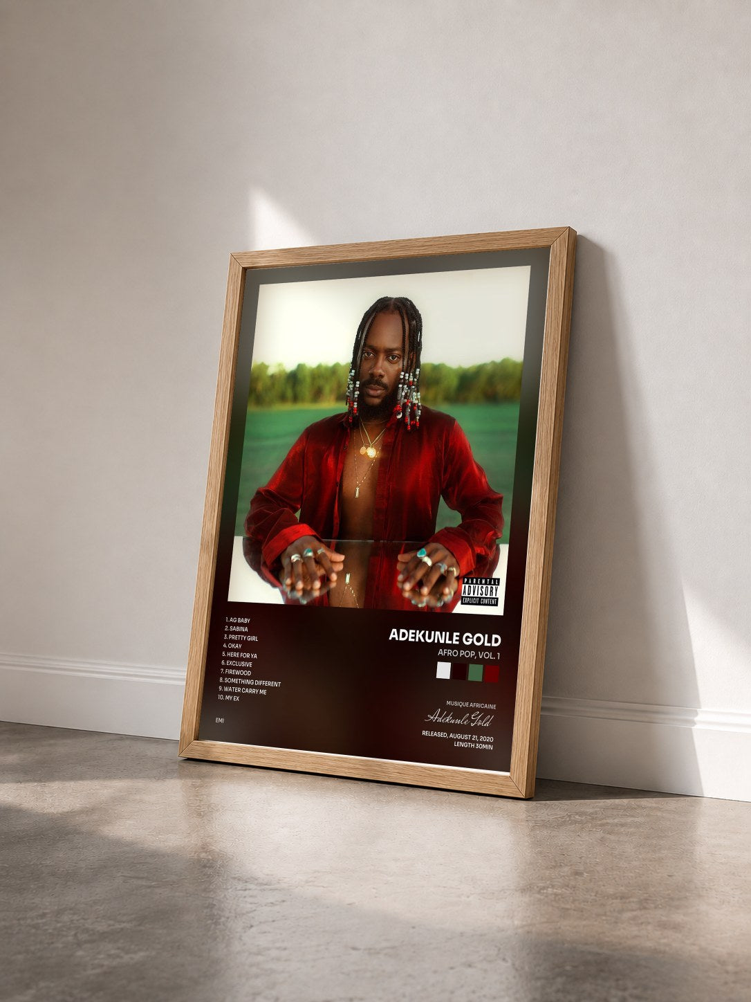 #bois Tableau de l'album Afro Pop, Vol. 1 de Adekunle Gold vu de trois quarts, cadre en bois brut