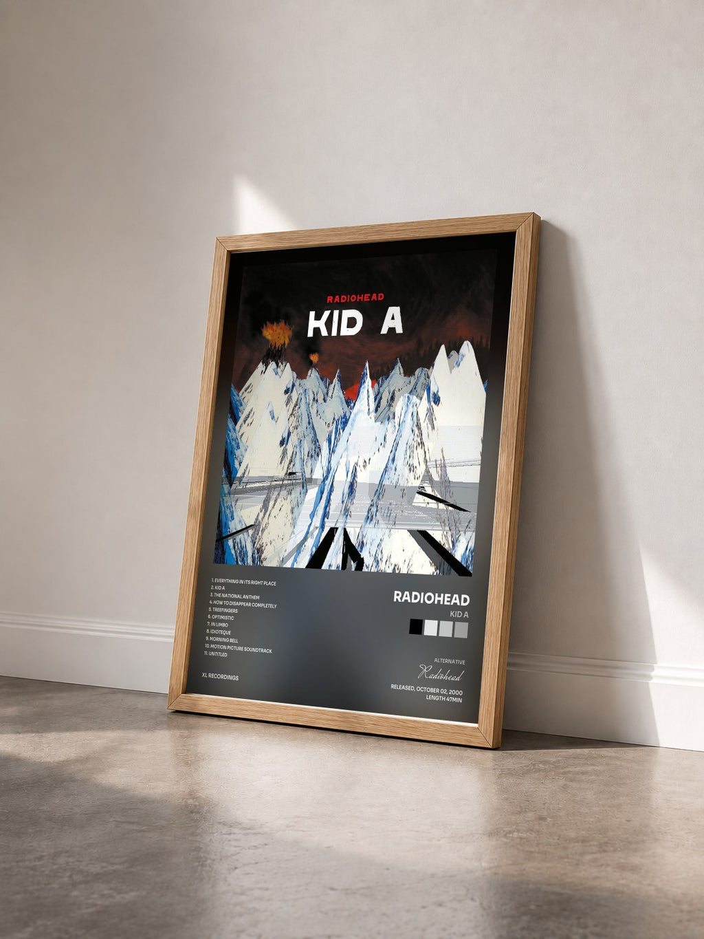 #bois Tableau de l'album Kid A de Radiohead vu de trois quarts, cadre en bois brut