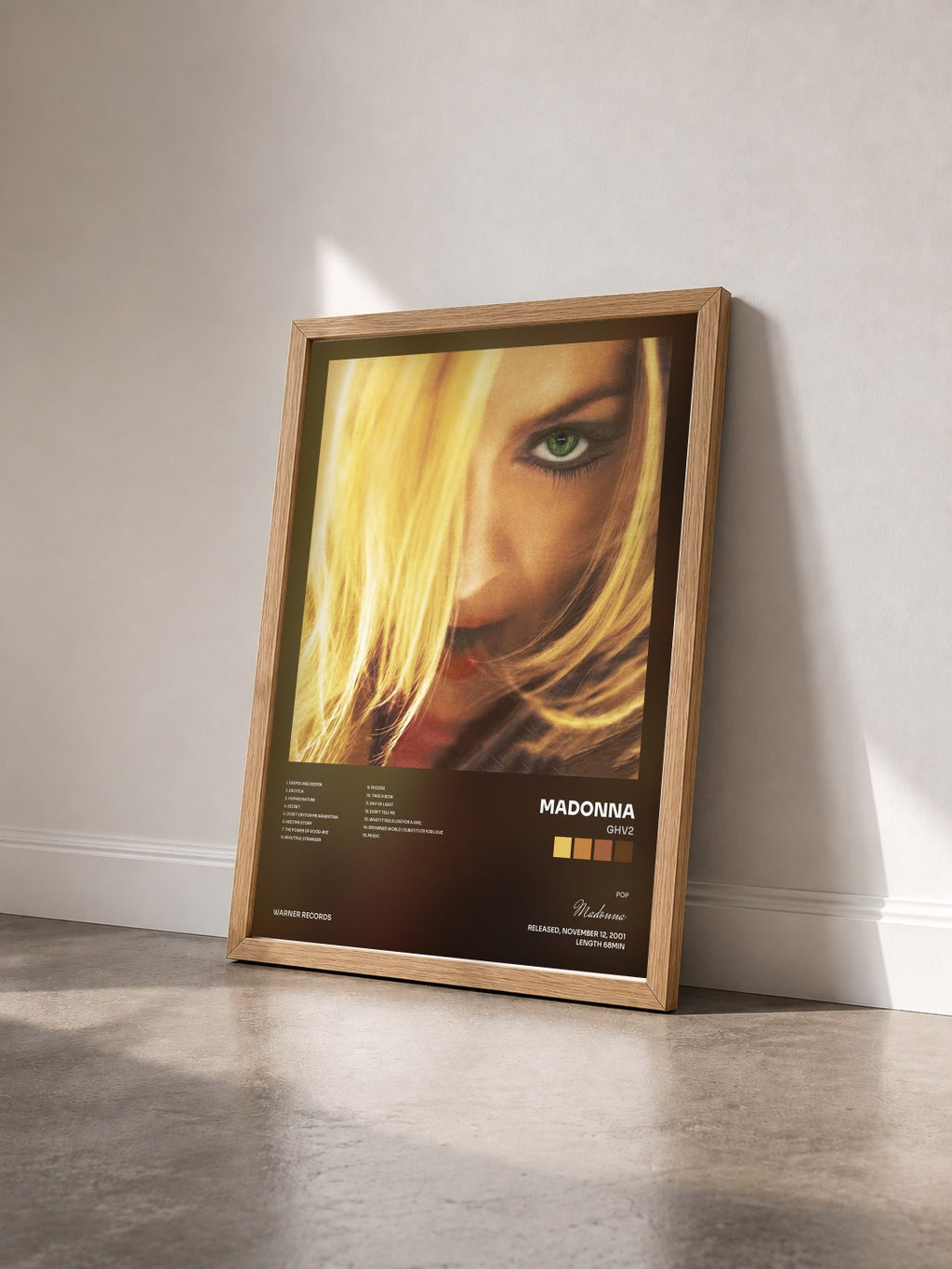 #bois Tableau de l'album GHV2 de Madonna vu de trois quarts, cadre en bois brut