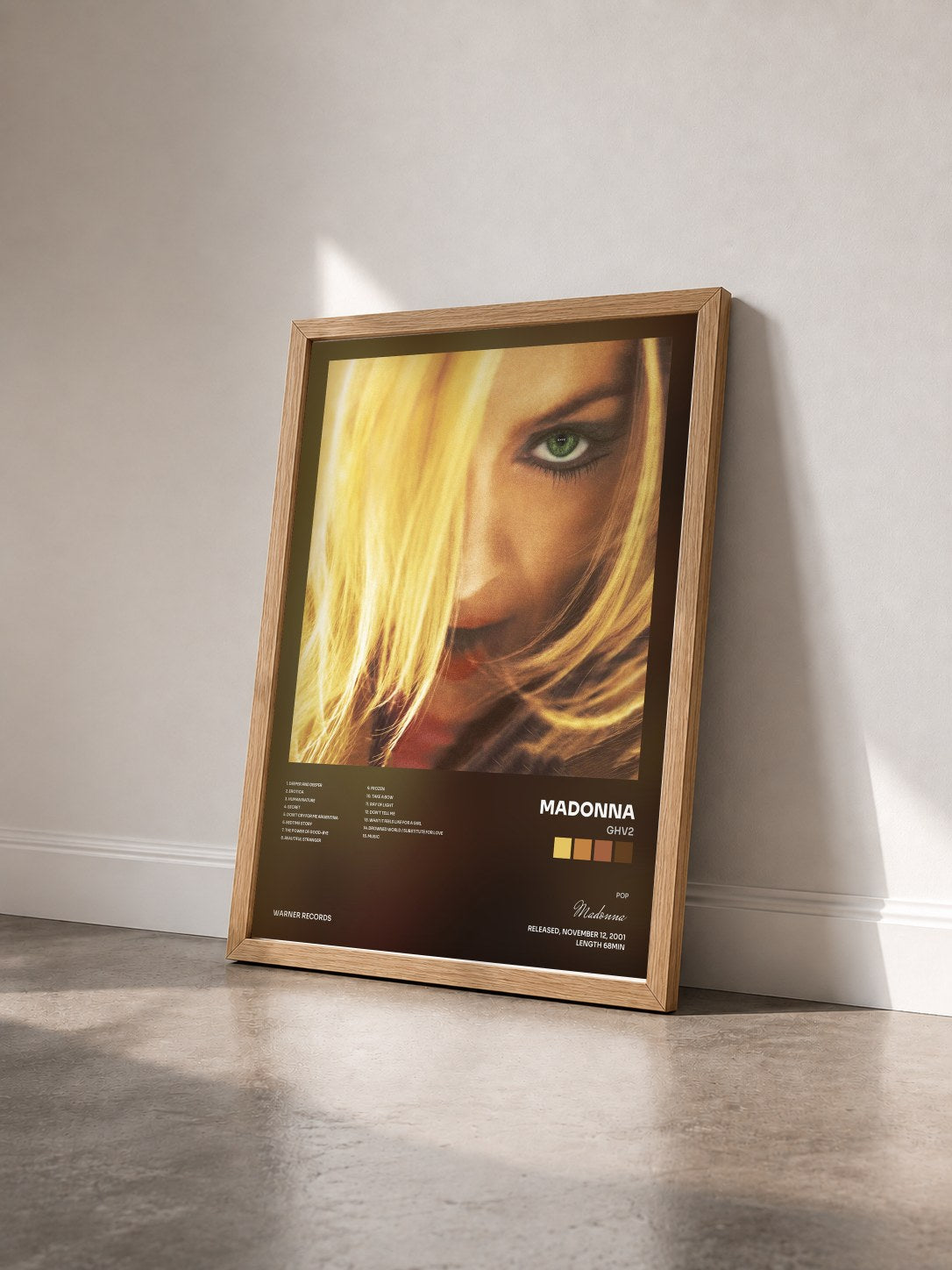 #bois Tableau de l'album GHV2 de Madonna vu de trois quarts, cadre en bois brut