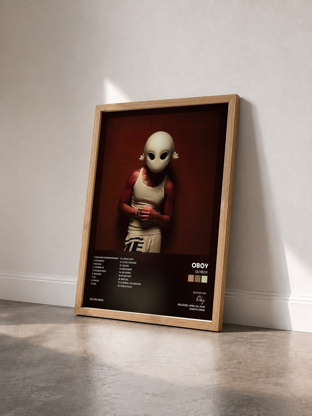 #bois Tableau de l'album Olyboy de Oboy vu de trois quarts, cadre en bois brut