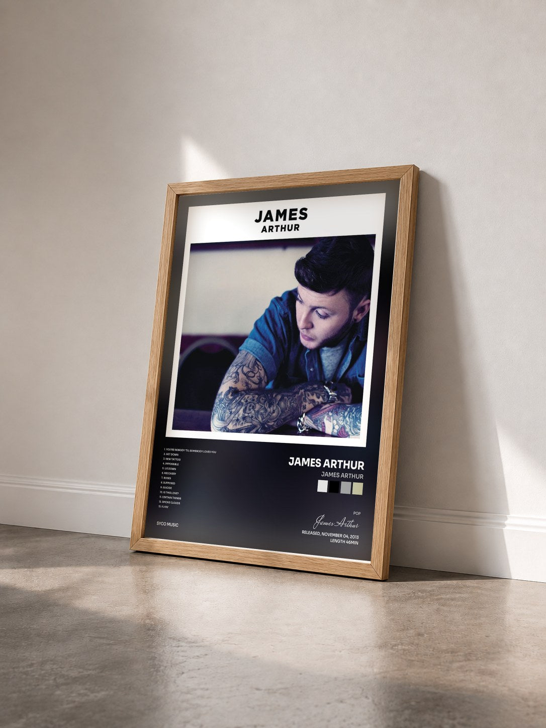 #bois Tableau de l'album James Arthur de James Arthur vu de trois quarts, cadre en bois brut