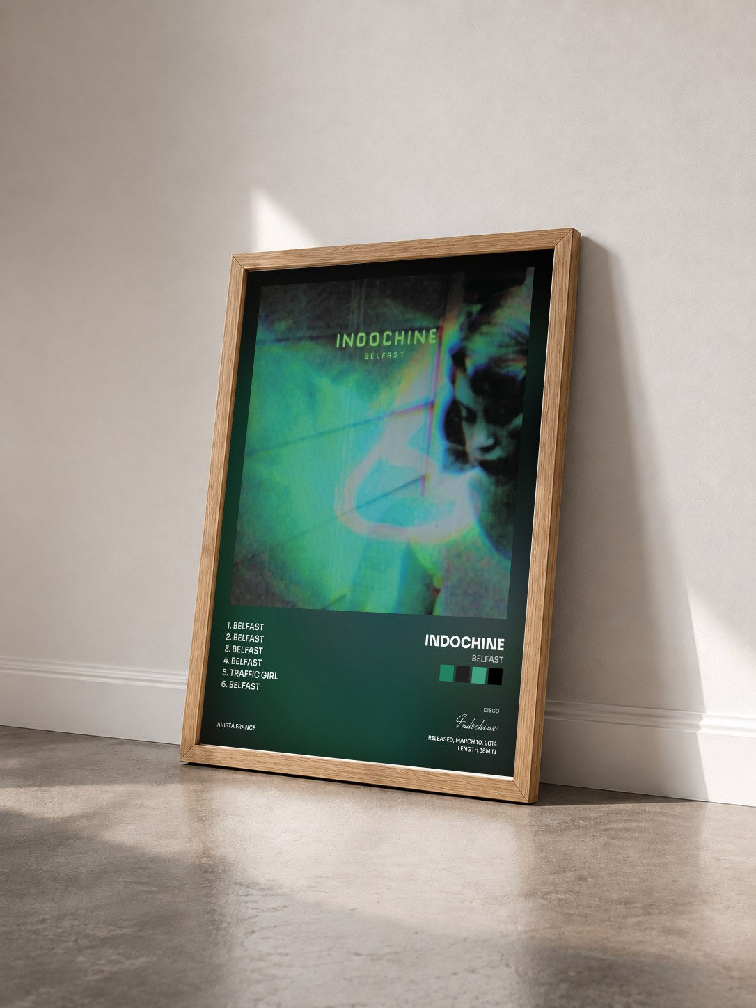 #bois Tableau de l'album Belfast de Indochine vu de trois quarts, cadre en bois brut