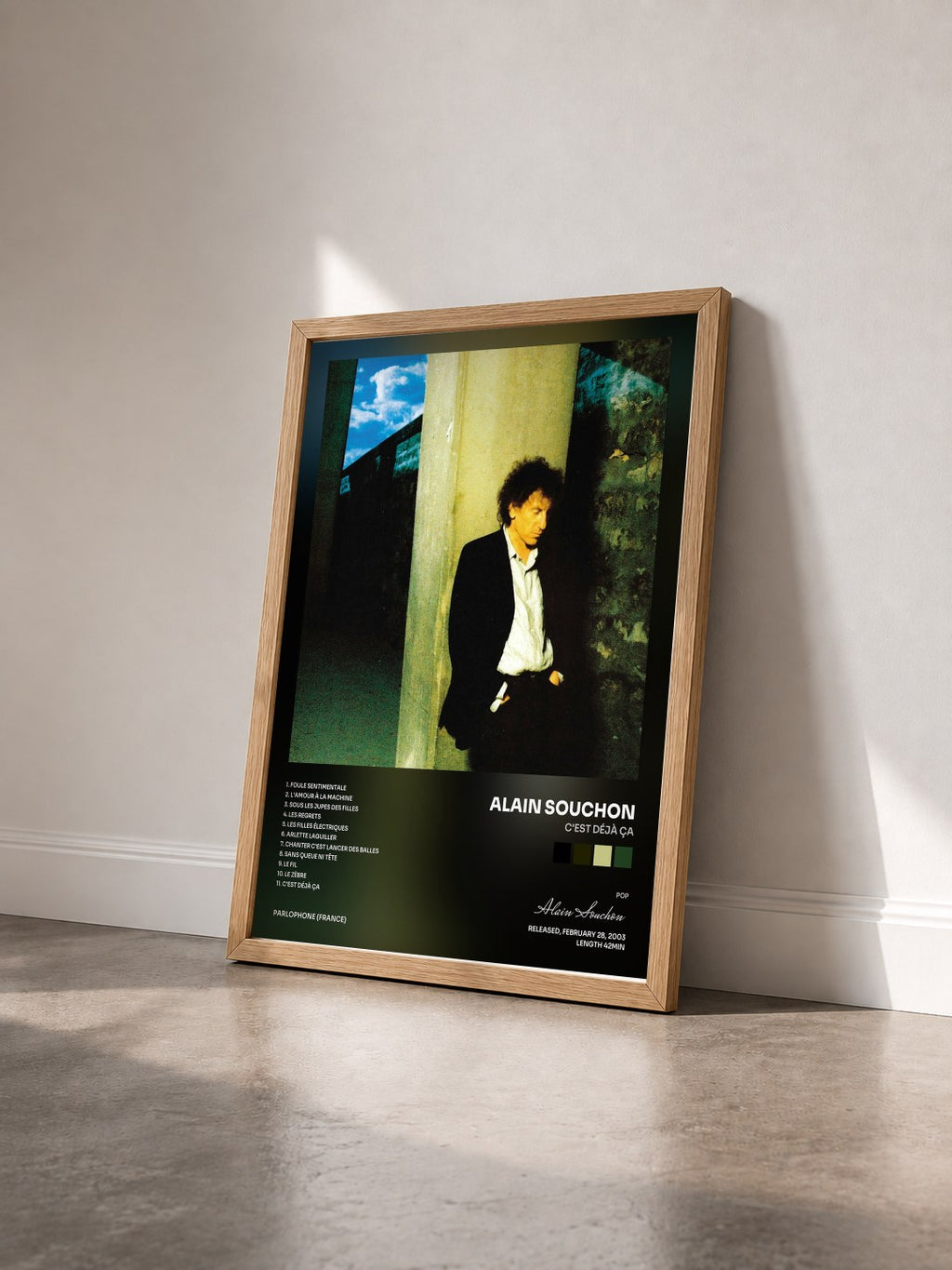 #bois Tableau de l'album C'est déjà ça de Alain Souchon vu de trois quarts, cadre en bois brut
