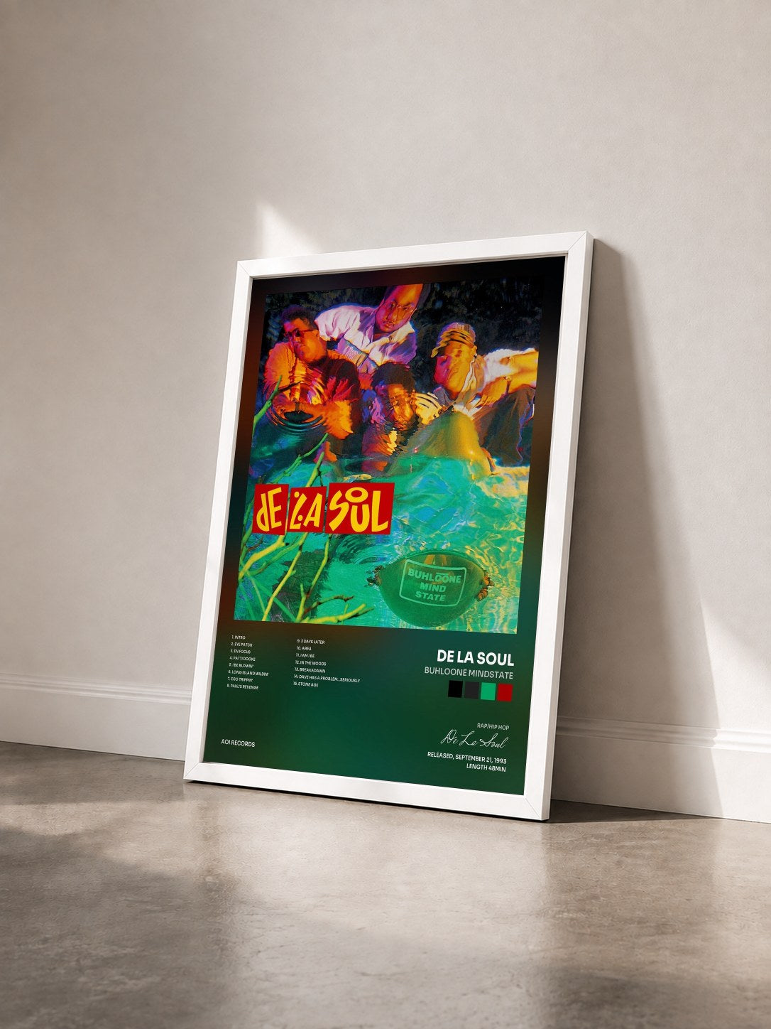 #blanc Tableau de l'album Buhloone Mindstate de De La Soul vu de trois quarts, cadre blanc
