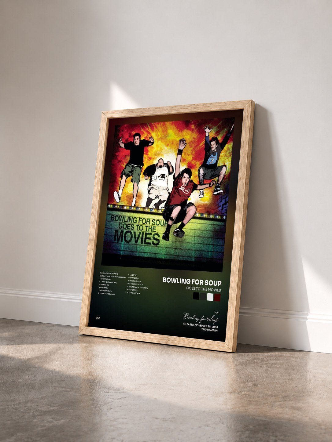 #bois Tableau de l'album Goes To The Movies de Bowling for Soup vu de trois quarts, cadre en bois brut