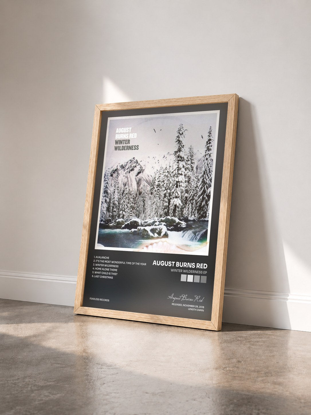 #bois Tableau de l'album Winter Wilderness EP de August Burns Red vu de trois quarts, cadre en bois brut