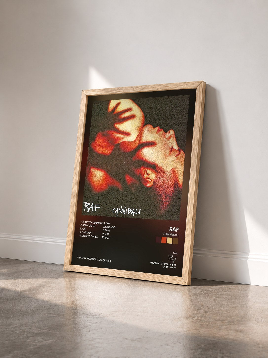 #bois Tableau de l'album Cannibali de Raf vu de trois quarts, cadre en bois brut
