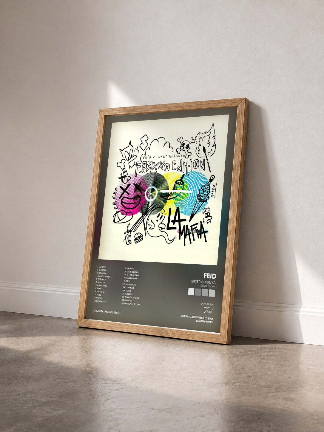 #bois Tableau de l'album INTER SHIBUYA (FERXXO EDITION) de Feid vu de trois quarts, cadre en bois brut