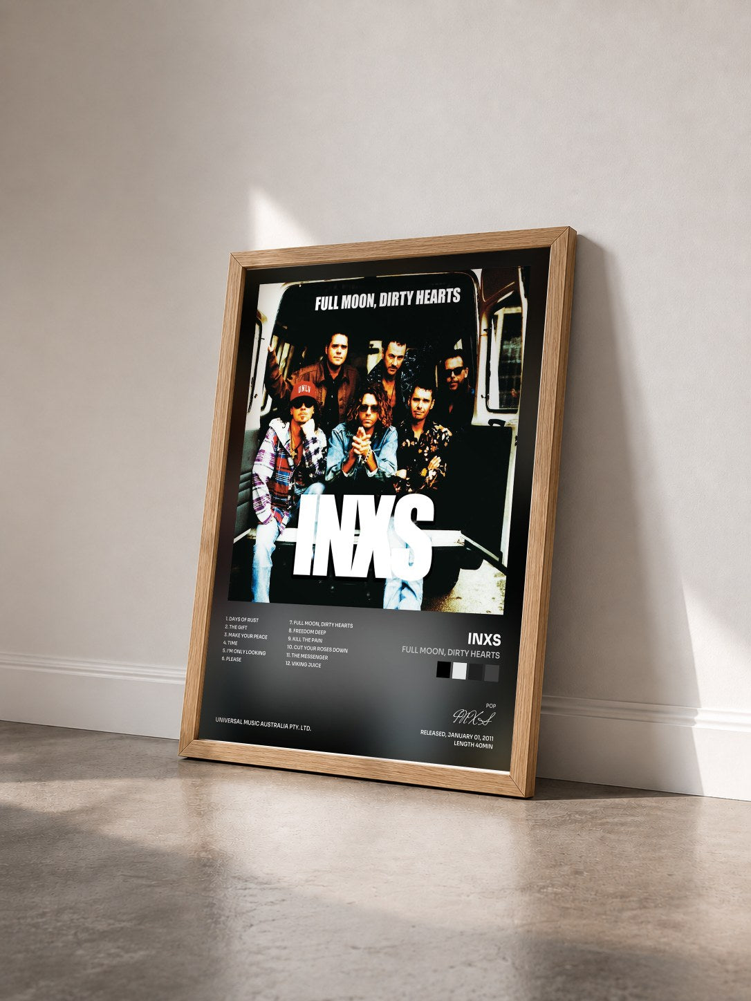 #bois Tableau de l'album Full Moon, Dirty Hearts de INXS vu de trois quarts, cadre en bois brut