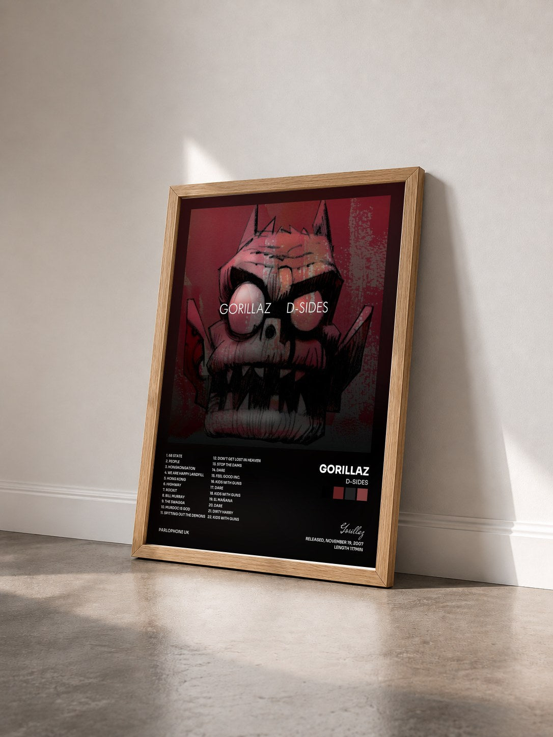 #bois Tableau de l'album D-Sides de Gorillaz vu de trois quarts, cadre en bois brut