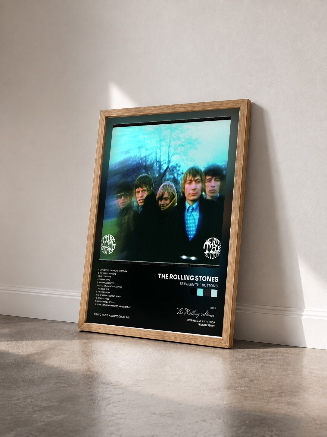 #bois Tableau de l'album Between The Buttons de The Rolling Stones vu de trois quarts, cadre en bois brut