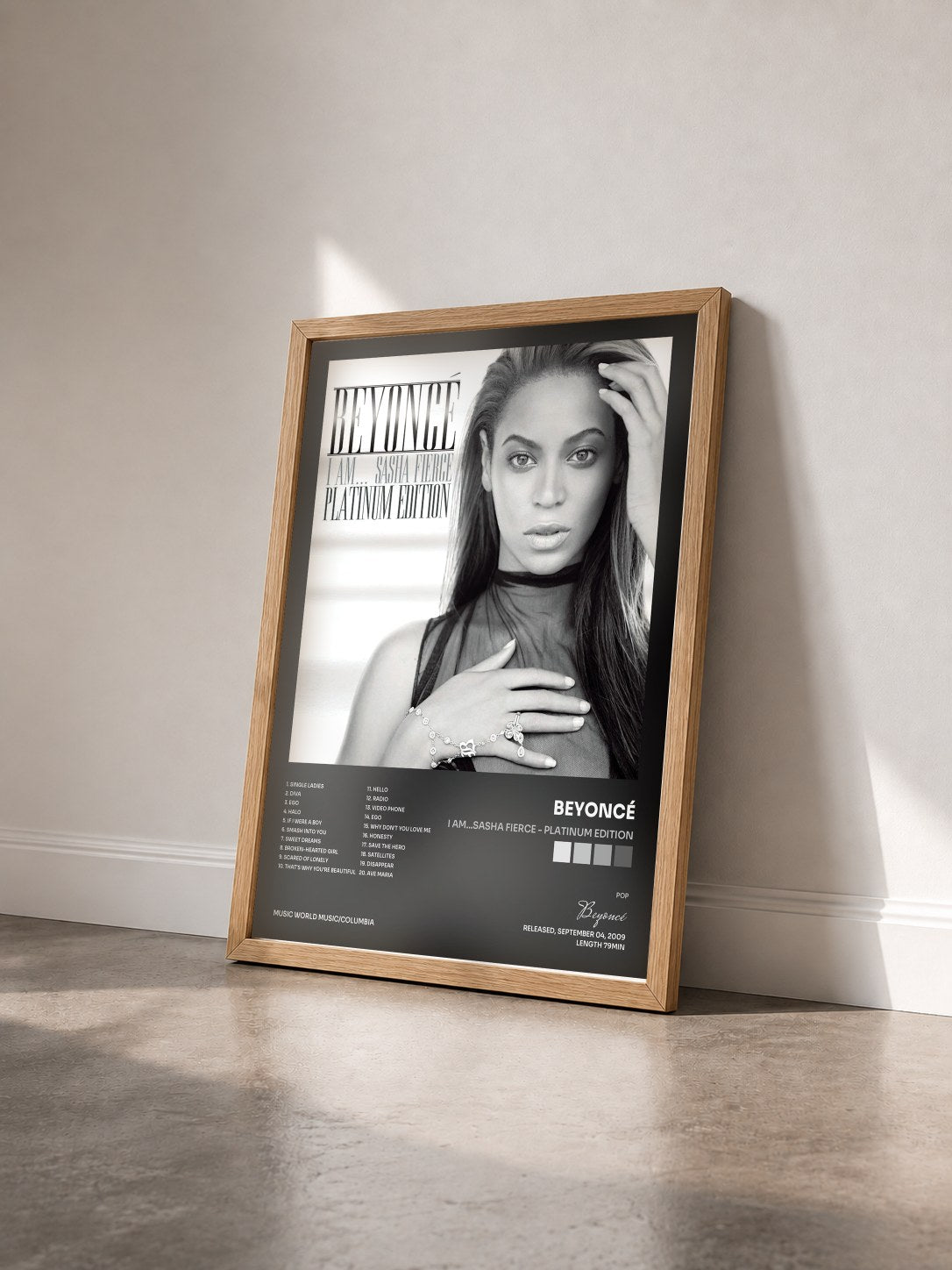 #bois Tableau de l'album I AM...SASHA FIERCE - Platinum Edition de Beyoncé vu de trois quarts, cadre en bois brut