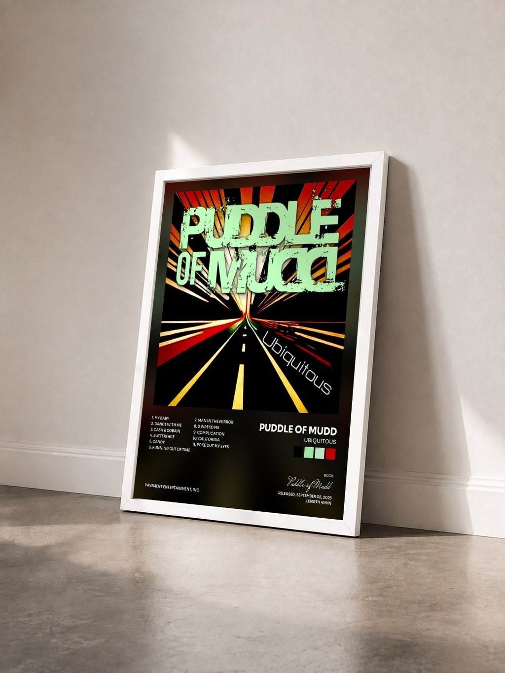 #blanc Tableau de l'album Ubiquitous de Puddle of Mudd vu de trois quarts, cadre blanc