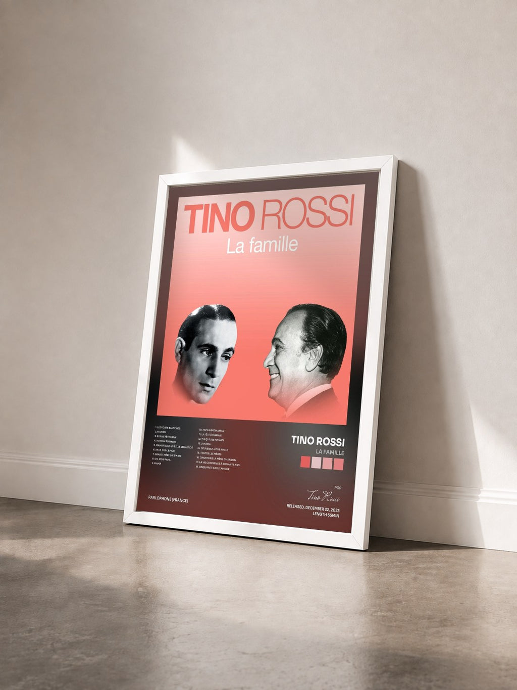 #blanc Tableau de l'album La famille de Tino Rossi vu de trois quarts, cadre blanc