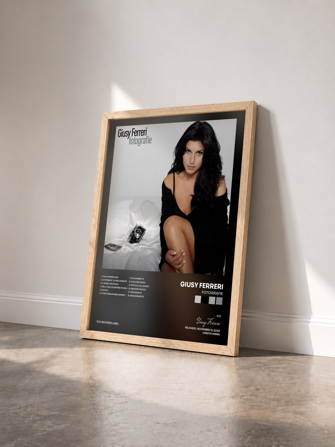 #bois Tableau de l'album Fotografie de Giusy Ferreri vu de trois quarts, cadre en bois brut