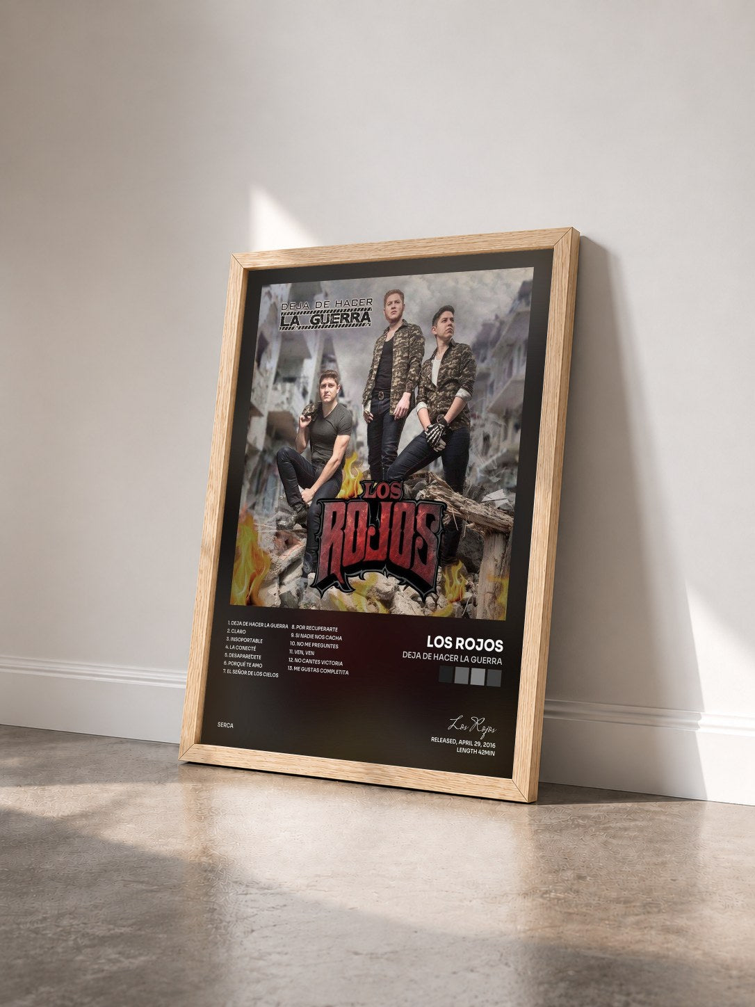 #bois Tableau de l'album Deja de Hacer la Guerra de Los Rojos vu de trois quarts, cadre en bois brut