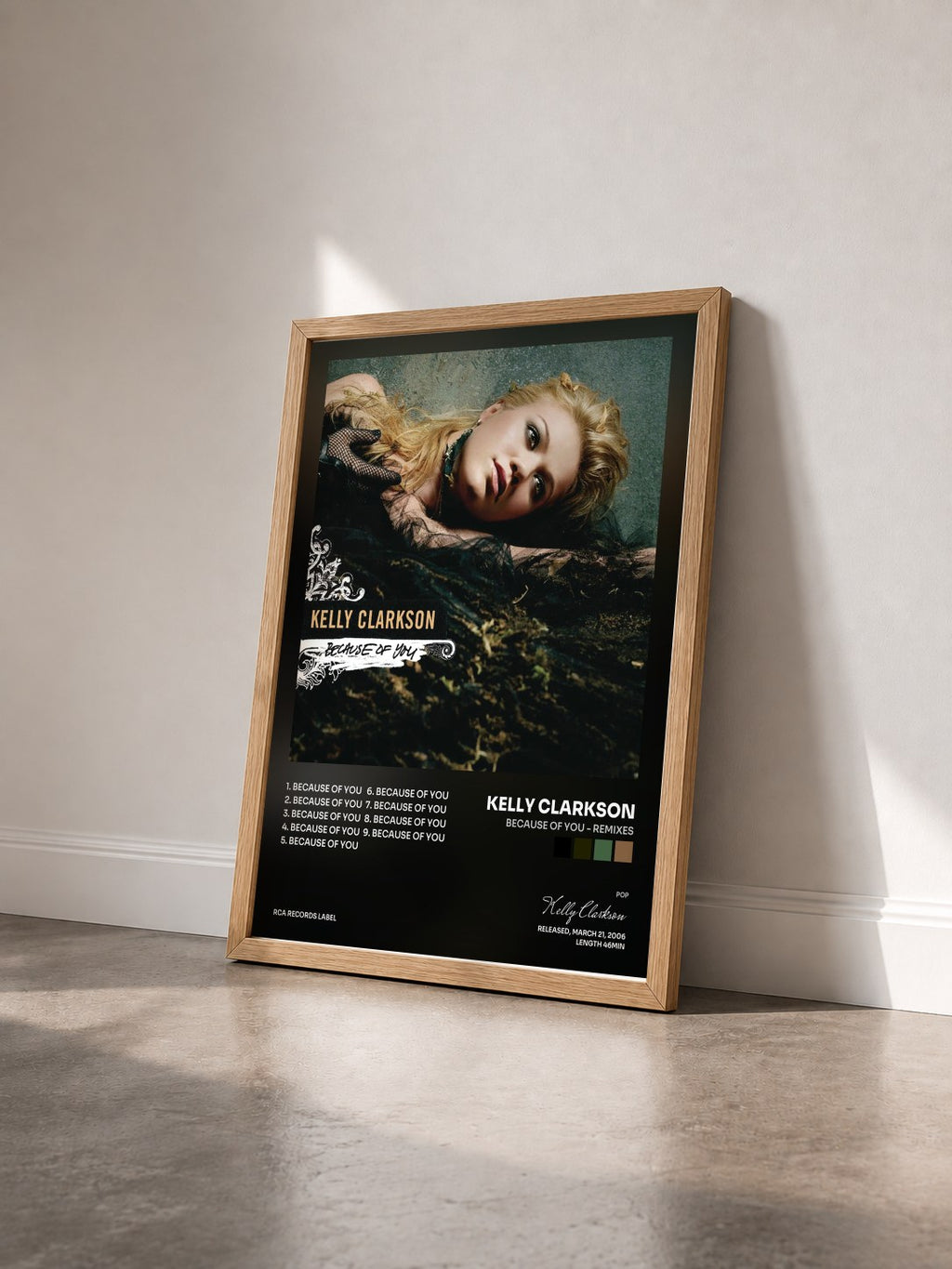#bois Tableau de l'album Because Of You - Remixes de Kelly Clarkson vu de trois quarts, cadre en bois brut