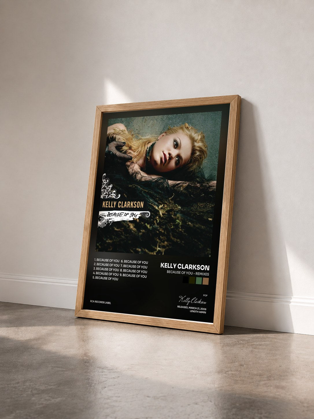 #bois Tableau de l'album Because Of You - Remixes de Kelly Clarkson vu de trois quarts, cadre en bois brut