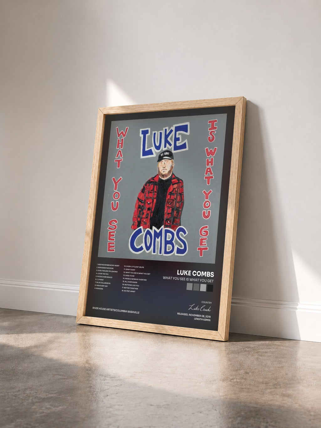 #bois Tableau de l'album What You See Is What You Get de Luke Combs vu de trois quarts, cadre en bois brut