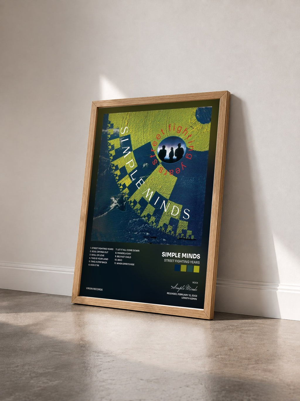 #bois Tableau de l'album Street Fighting Years de Simple Minds vu de trois quarts, cadre en bois brut