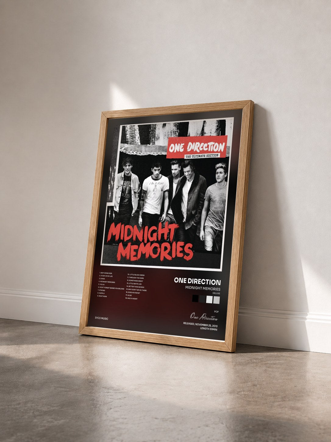 #bois Tableau de l'album Midnight Memories (Deluxe) de One Direction vu de trois quarts, cadre en bois brut