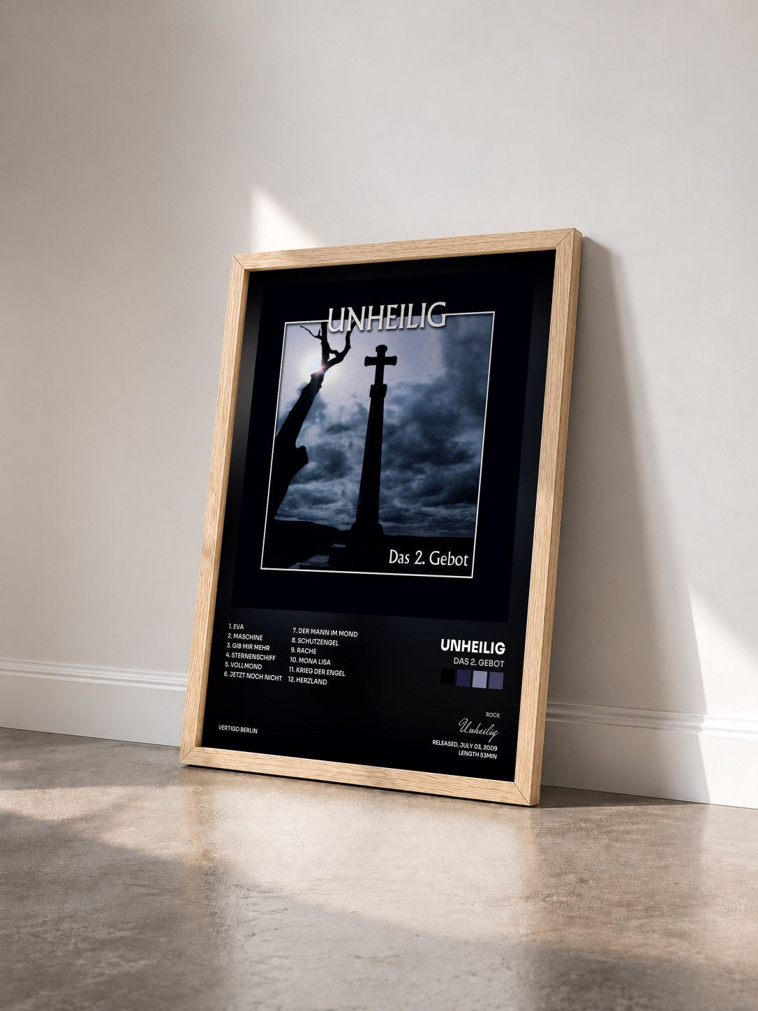 #bois Tableau de l'album Das 2. Gebot de Unheilig vu de trois quarts, cadre en bois brut