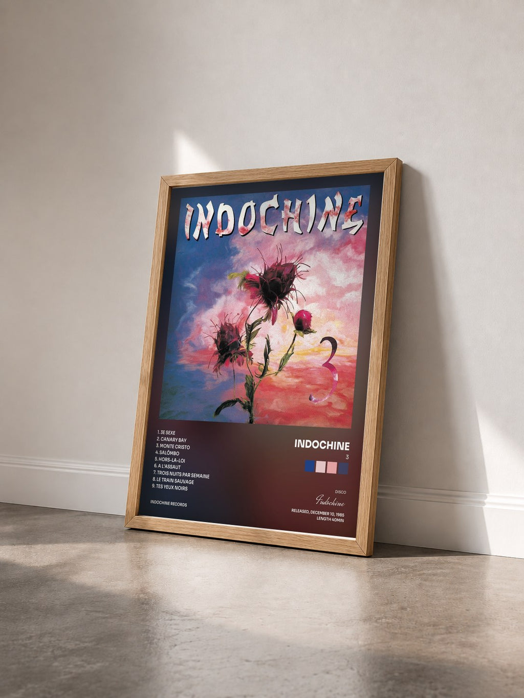 #bois Tableau de l'album 3 de Indochine vu de trois quarts, cadre en bois brut