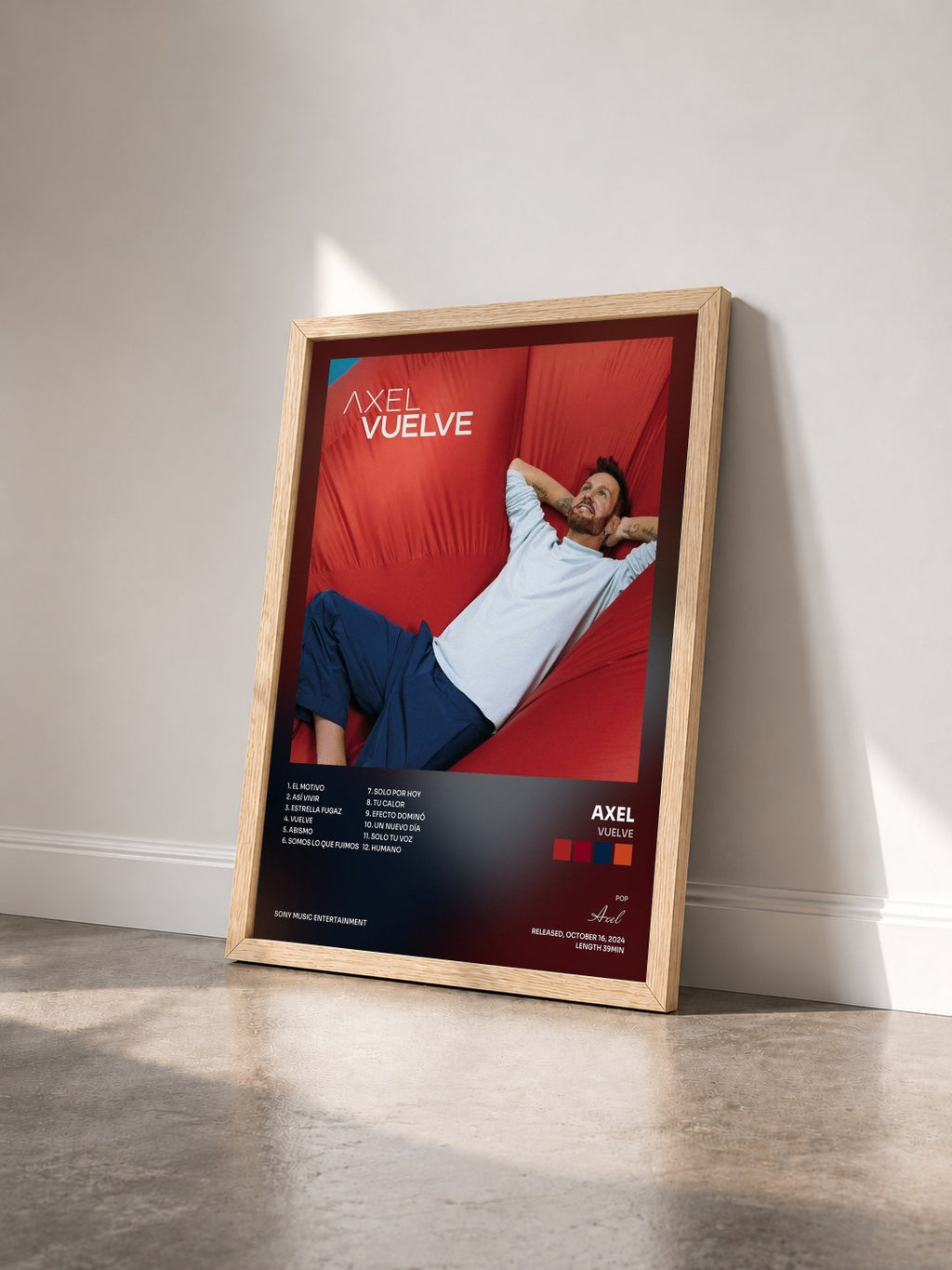 #bois Tableau de l'album Vuelve de Axel vu de trois quarts, cadre en bois brut