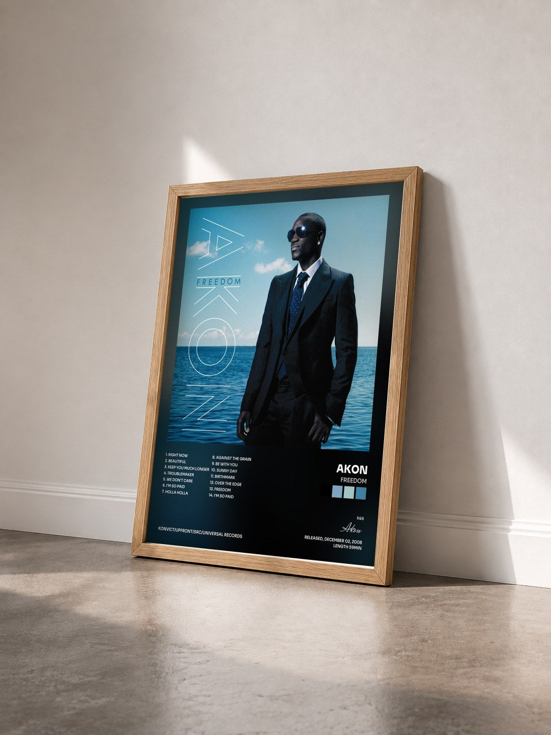 #bois Tableau de l'album Freedom de Akon vu de trois quarts, cadre en bois brut