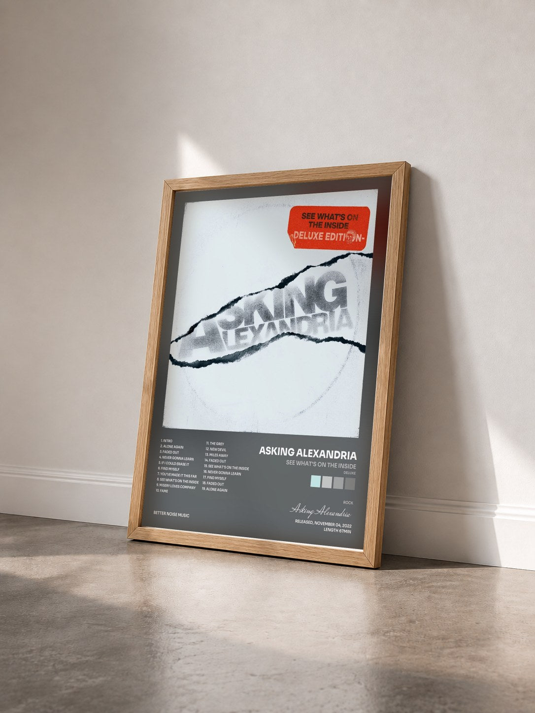 #bois Tableau de l'album See What's On The Inside (Deluxe) de Asking Alexandria vu de trois quarts, cadre en bois brut