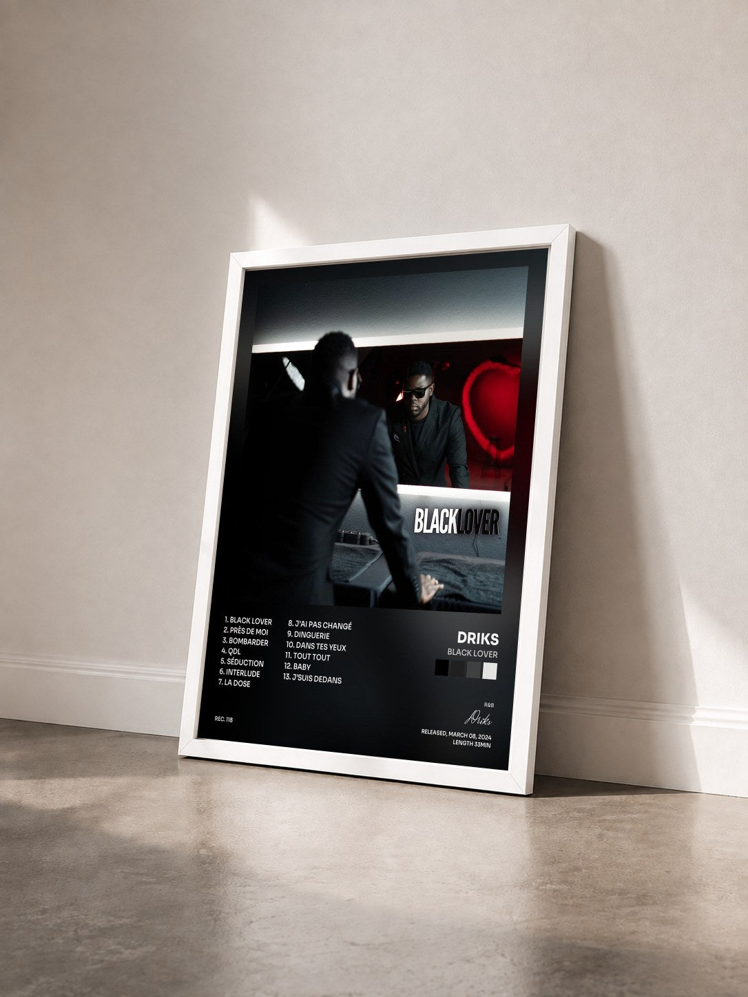 #blanc Tableau de l'album Black Lover de Driks vu de trois quarts, cadre blanc
