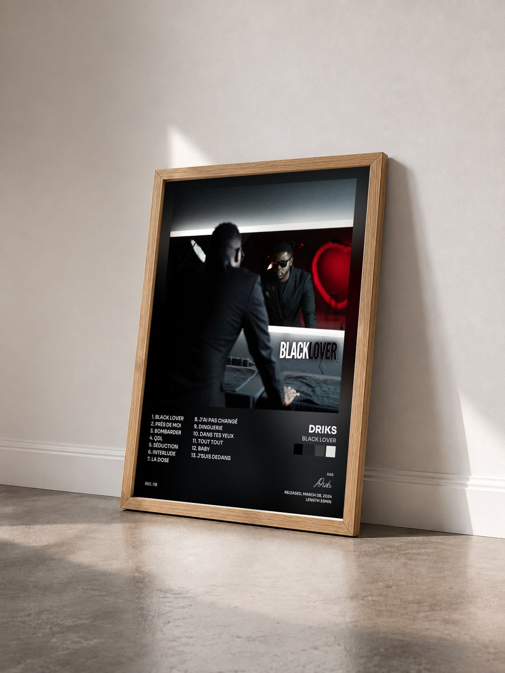 #bois Tableau de l'album Black Lover de Driks vu de trois quarts, cadre en bois brut