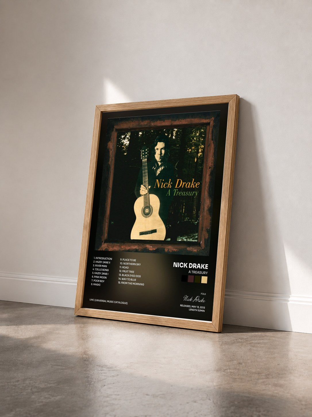 #bois Tableau de l'album A Treasury de Nick Drake vu de trois quarts, cadre en bois brut