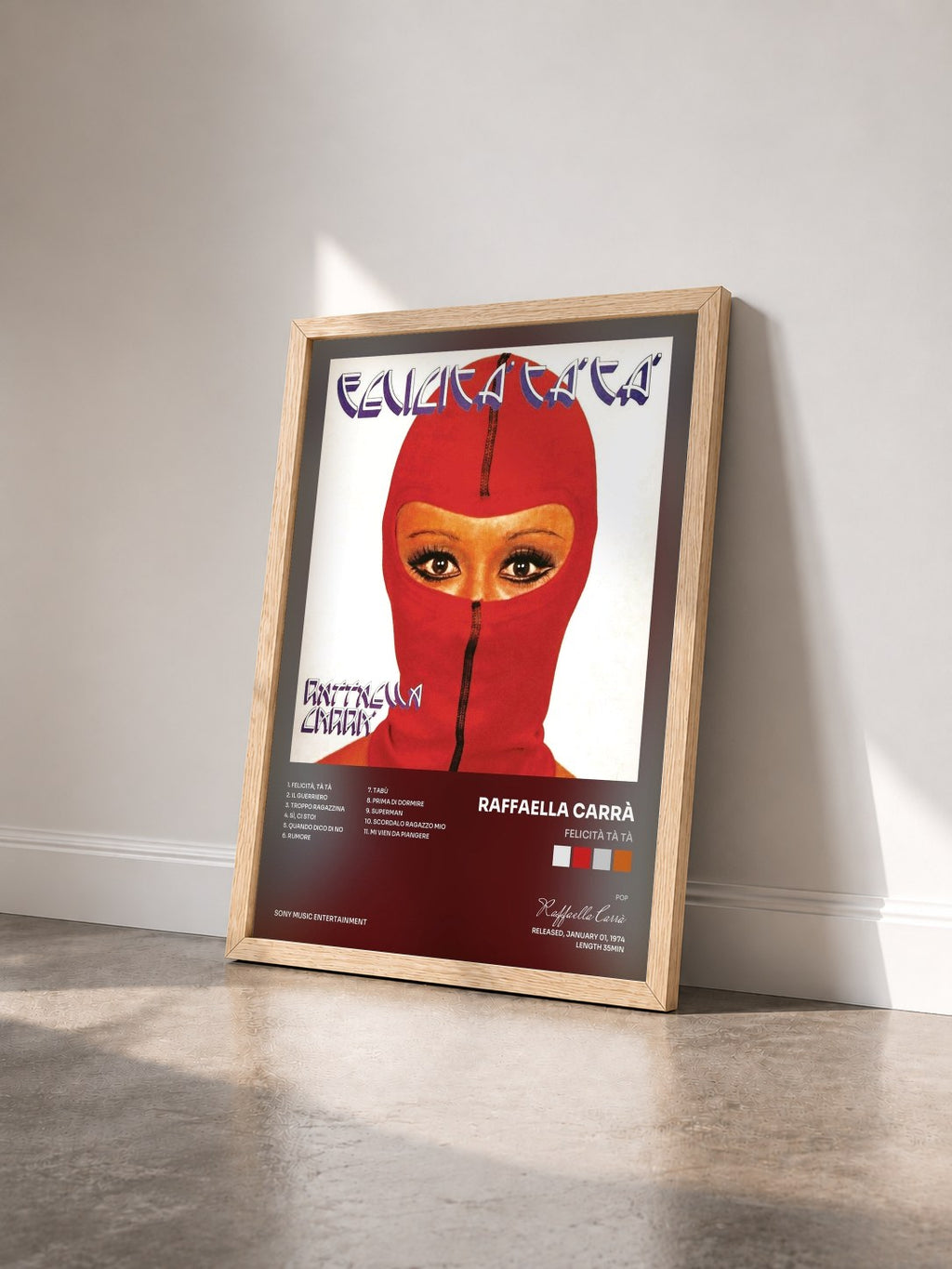 #bois Tableau de l'album Felicità Tà Tà de Raffaella Carrà vu de trois quarts, cadre en bois brut