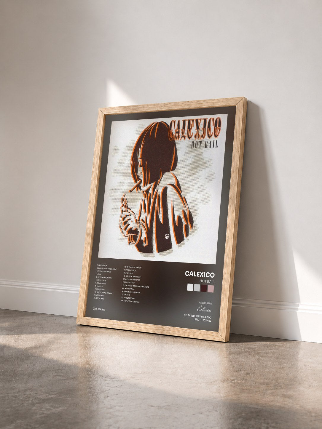 #bois Tableau de l'album Hot Rail de Calexico vu de trois quarts, cadre en bois brut
