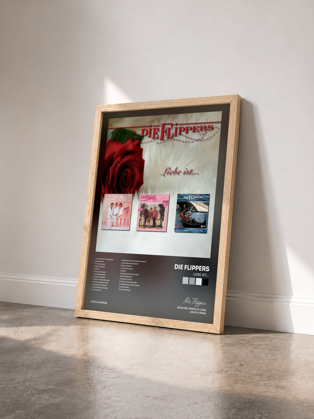 #bois Tableau de l'album Liebe ist... de Die Flippers vu de trois quarts, cadre en bois brut