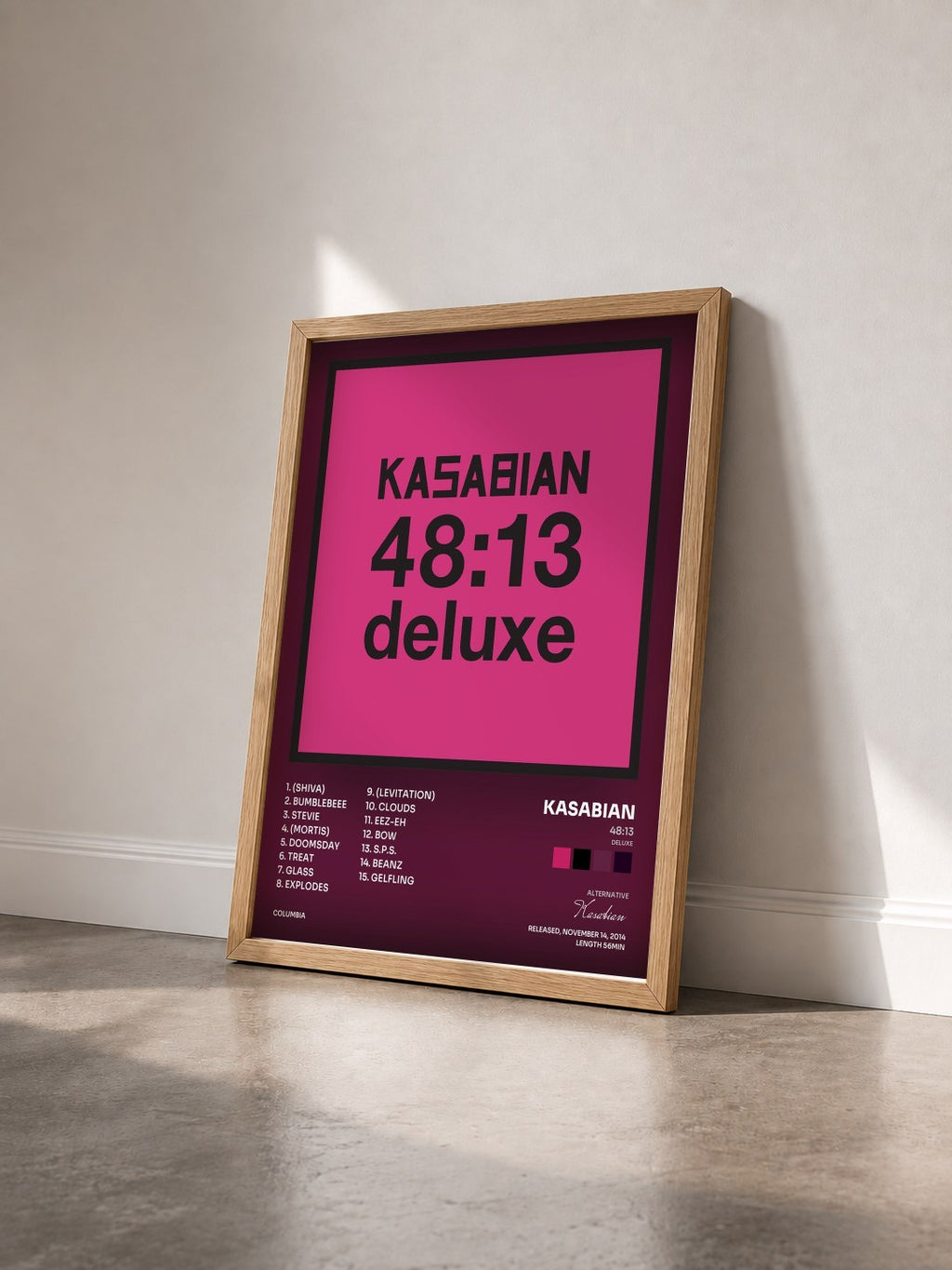 #bois Tableau de l'album 48:13 (Deluxe) de Kasabian vu de trois quarts, cadre en bois brut