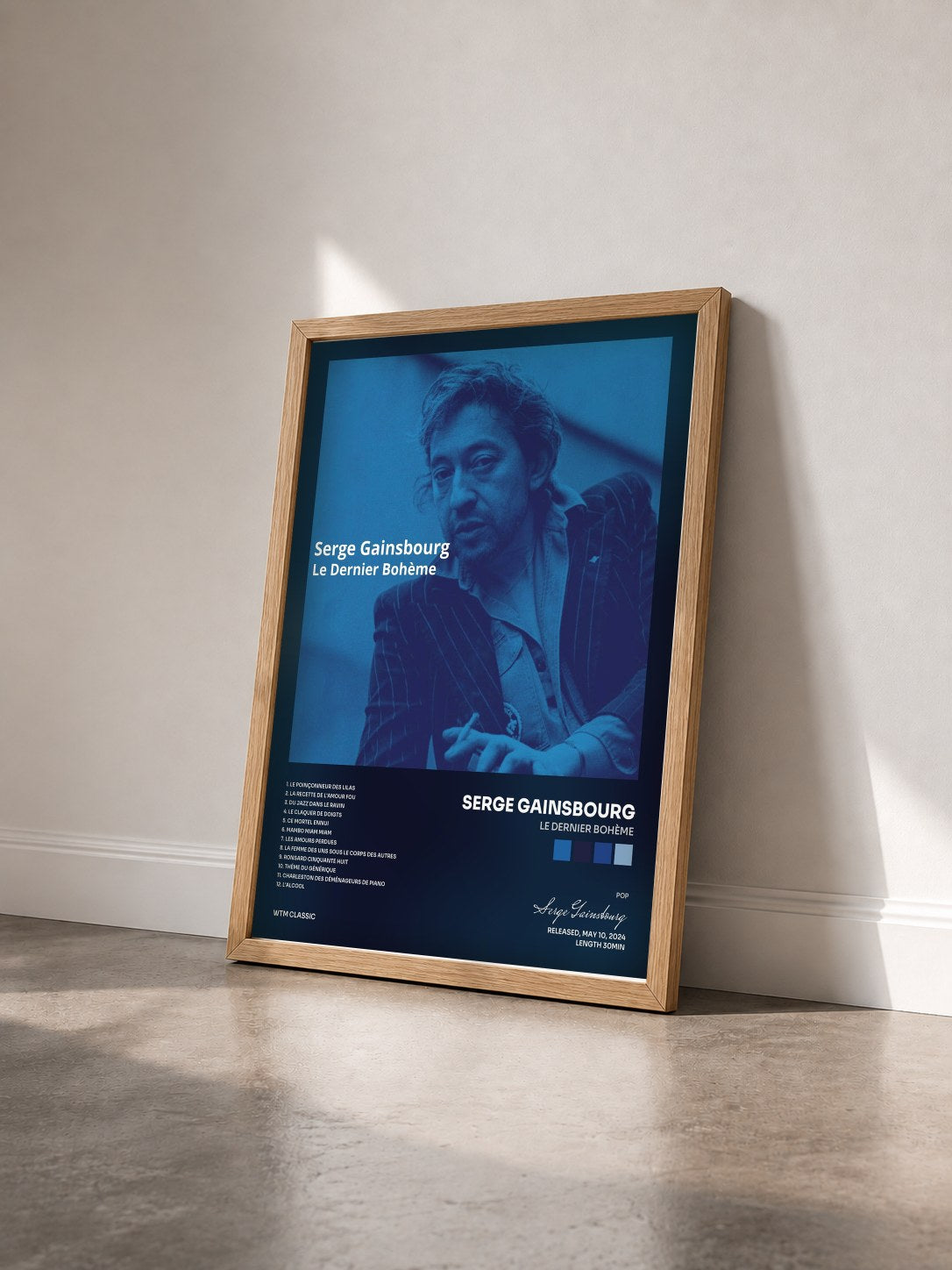 #bois Tableau de l'album Le Dernier Bohème de Serge Gainsbourg vu de trois quarts, cadre en bois brut
