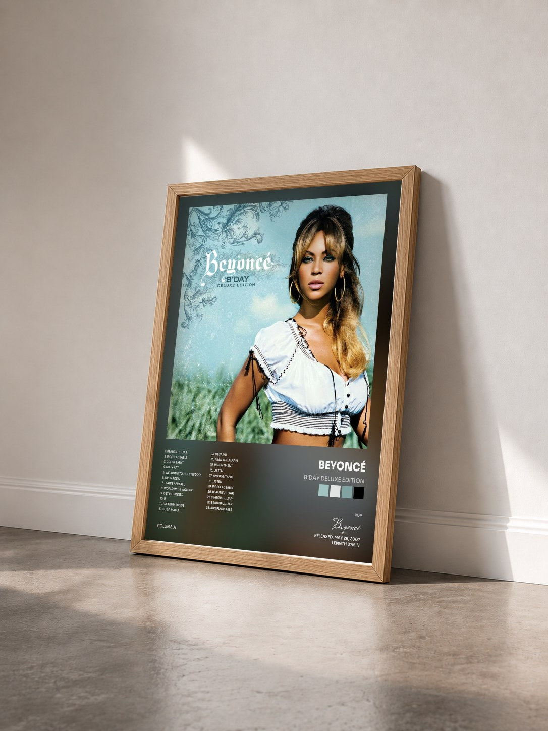 #bois Tableau de l'album B'Day Deluxe Edition de Beyoncé vu de trois quarts, cadre en bois brut