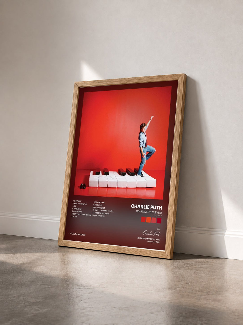 #bois Tableau de l'album Whatever's Clever! (Expanded) de Charlie Puth vu de trois quarts, cadre en bois brut
