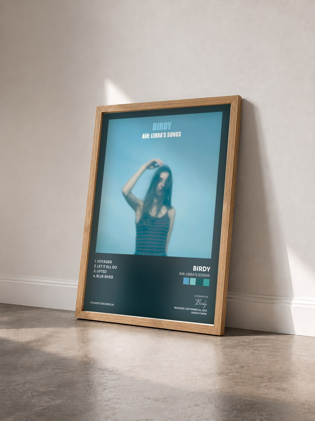 #bois Tableau de l'album Air: Libra's Songs de Birdy vu de trois quarts, cadre en bois brut