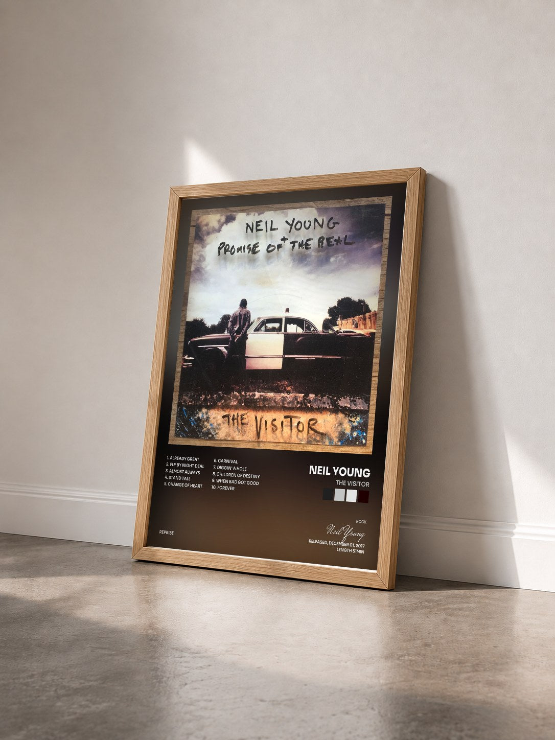#bois Tableau de l'album The Visitor de Neil Young vu de trois quarts, cadre en bois brut