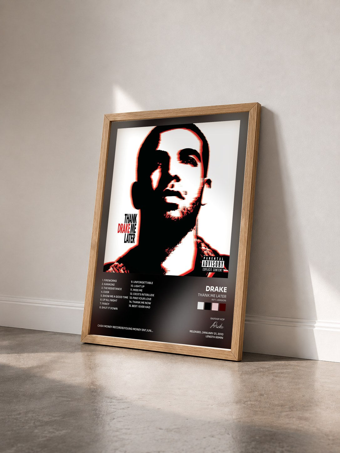 #bois Tableau de l'album Thank Me Later (Int'l Version) de Drake vu de trois quarts, cadre en bois brut