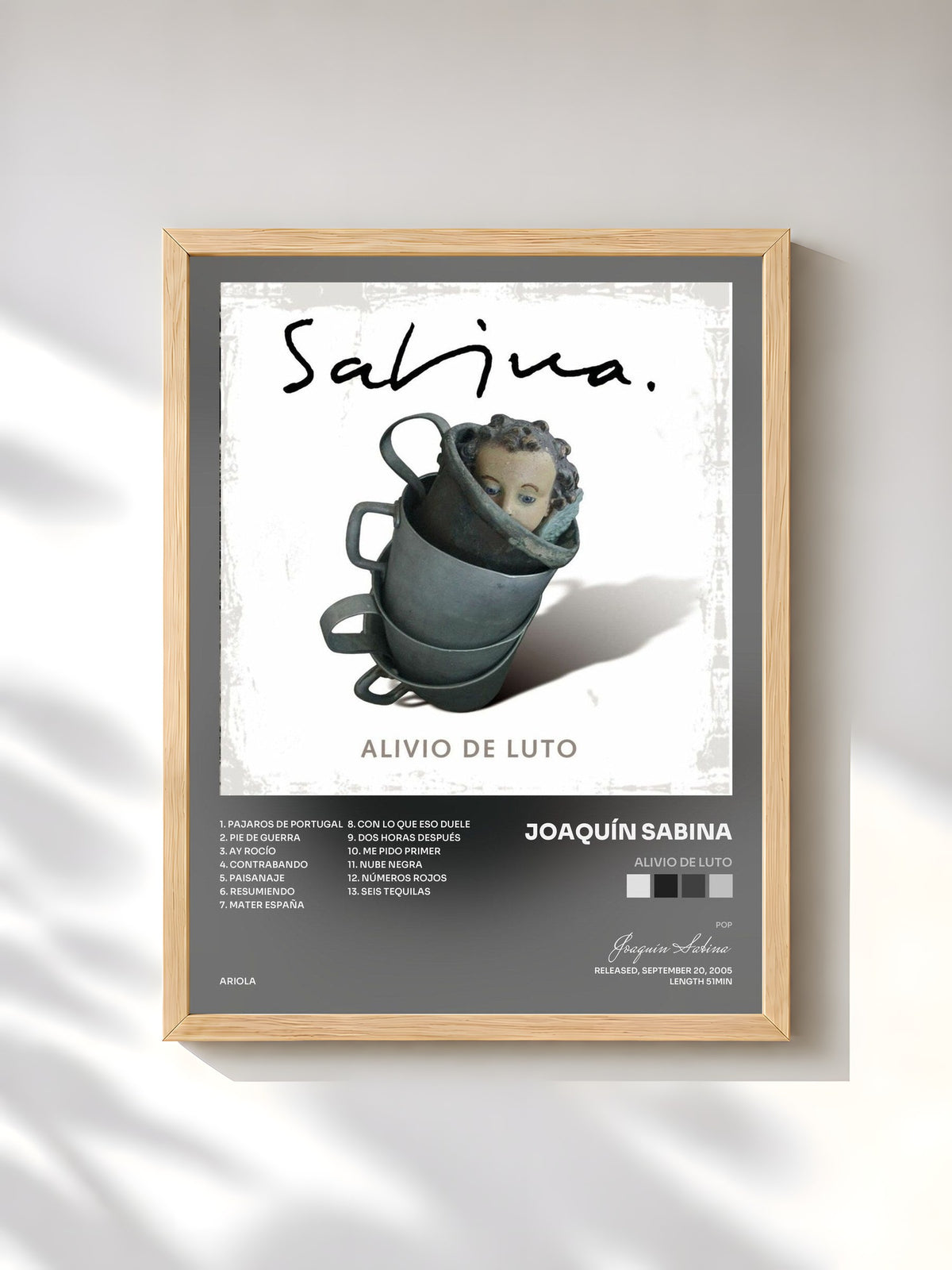 #bois Tableau de l'album Alivio De Luto de Joaquín Sabina, cadre en bois brut, imprimé et encadré en France