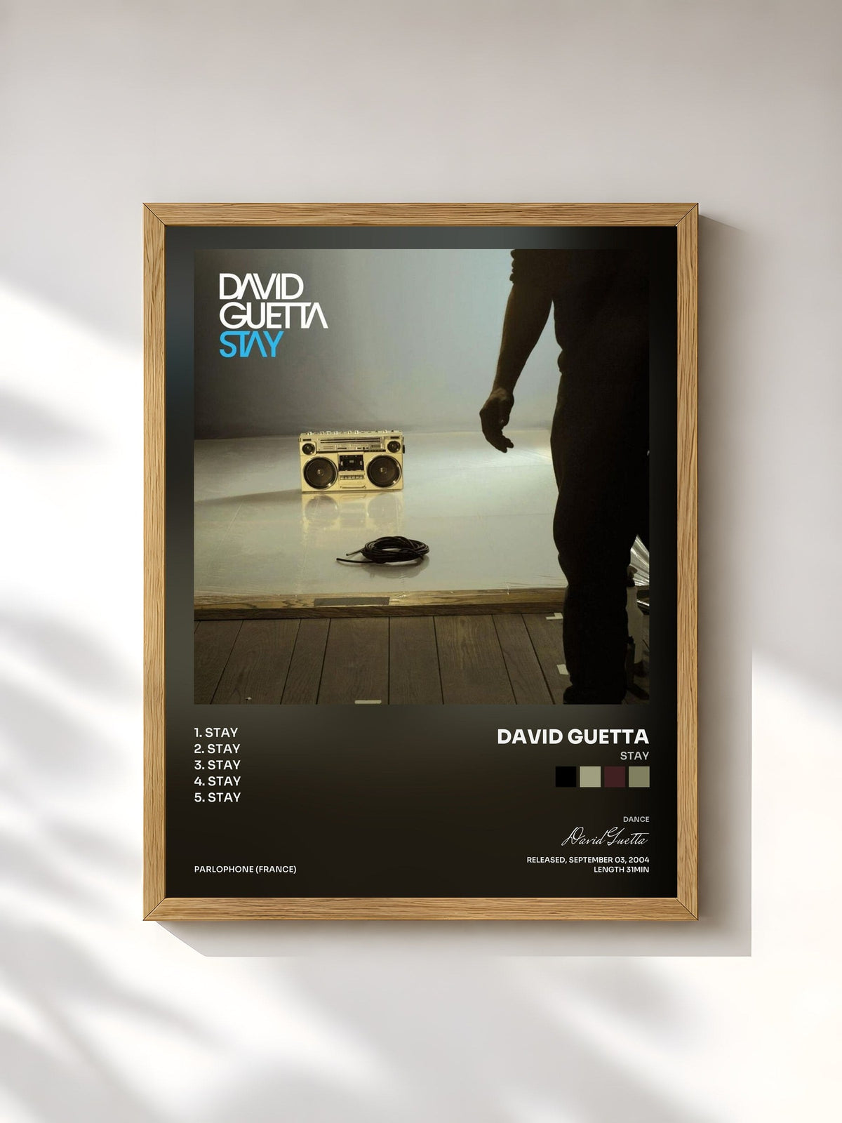 #bois Tableau de l'album Stay de David Guetta, cadre en bois brut, imprimé et encadré en France