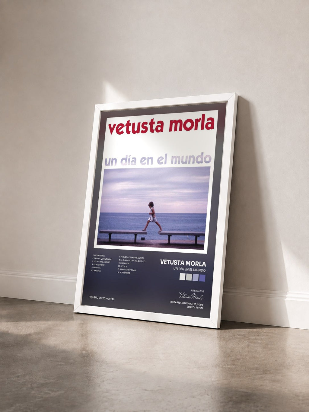 #blanc Tableau de l'album Un Día en el Mundo de Vetusta Morla vu de trois quarts, cadre blanc