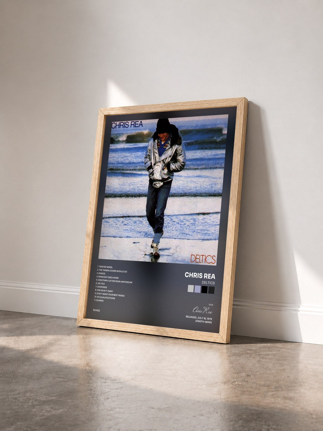 #bois Tableau de l'album Deltics de Chris Rea vu de trois quarts, cadre en bois brut