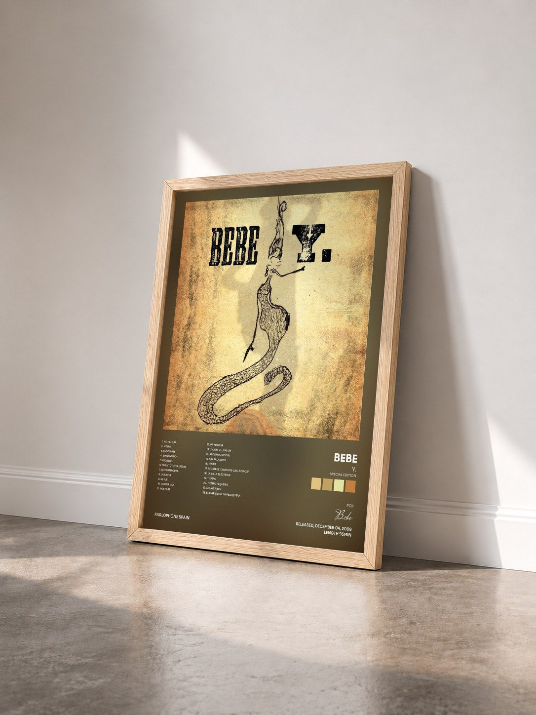 #bois Tableau de l'album Y. (Special Edition) de Bebe vu de trois quarts, cadre en bois brut