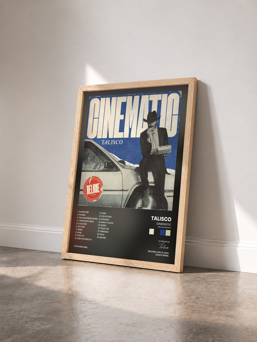 #bois Tableau de l'album Cinematic (Deluxe Version) de Talisco vu de trois quarts, cadre en bois brut